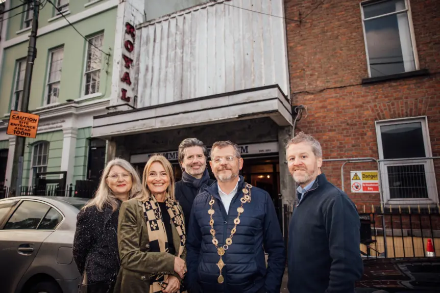 Supporting team pictured outside the old cinema